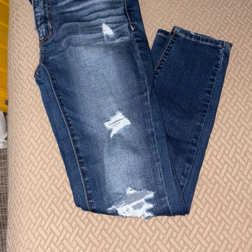 Women's Distressed Blue Jeans